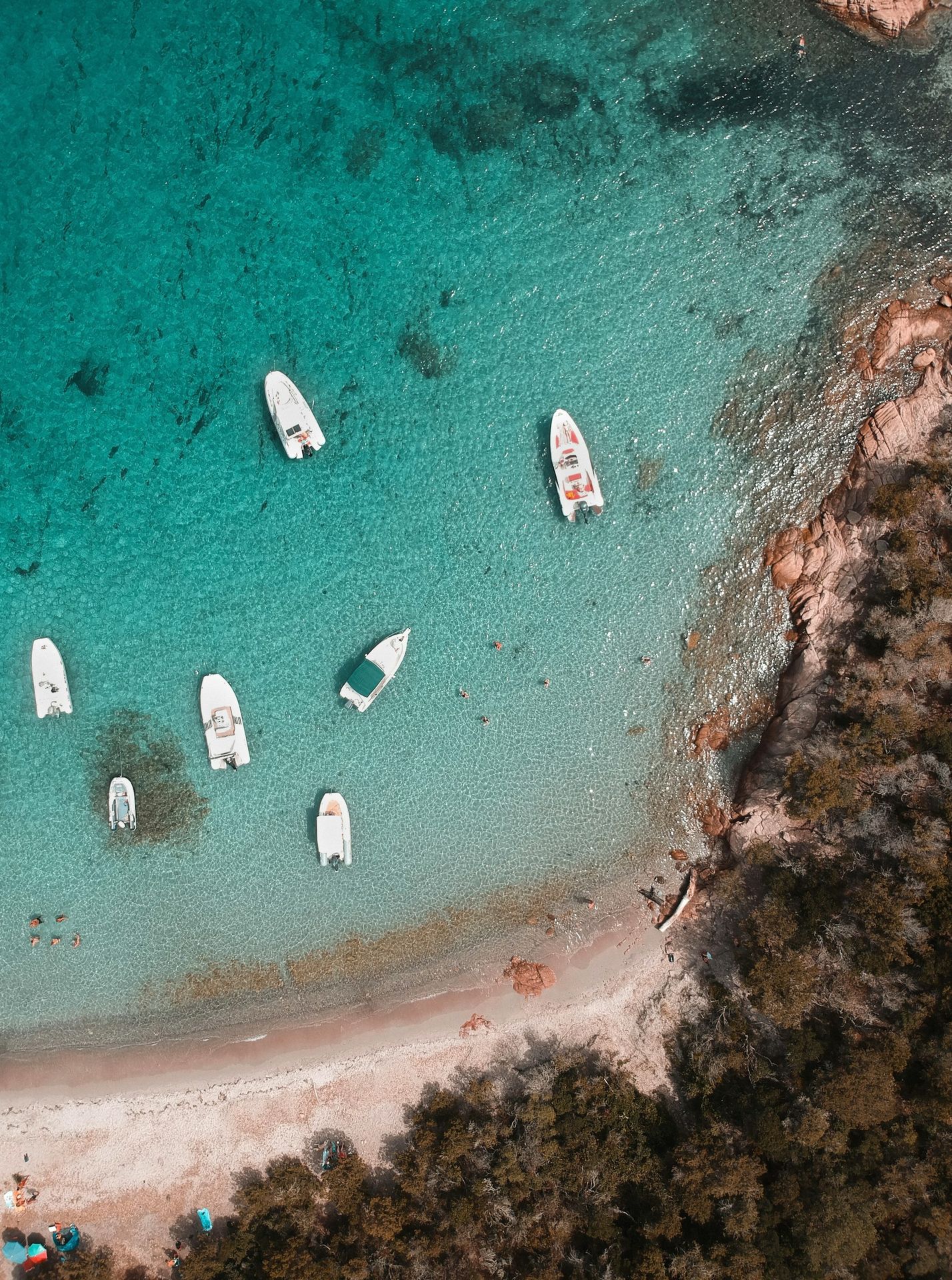 aerial view of boats on sea during daytime